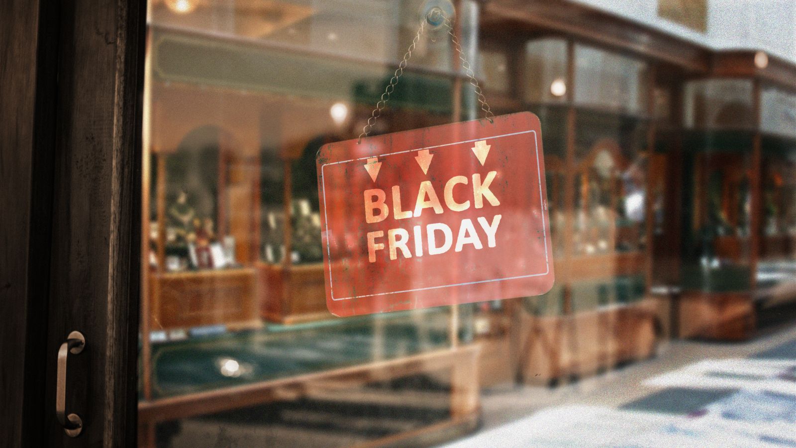 Letrero de Black Friday colgado en la vitrina de una tienda